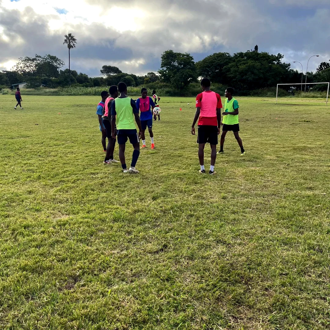 Small group training session on the field